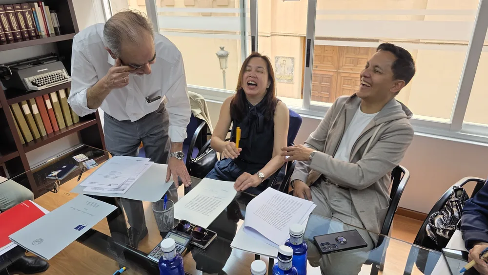 A shared laugh right after signing